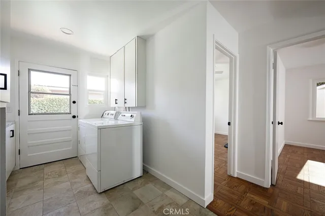 a room with a sink and a mirror