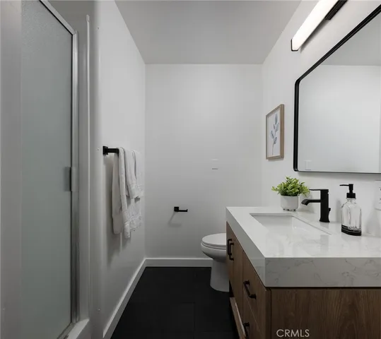 a bathroom with a sink and a toilet