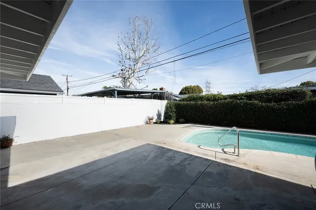 a view of a backyard of a house