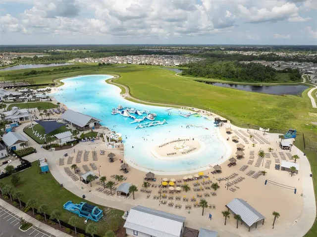 a view of a swimming pool with a lake view
