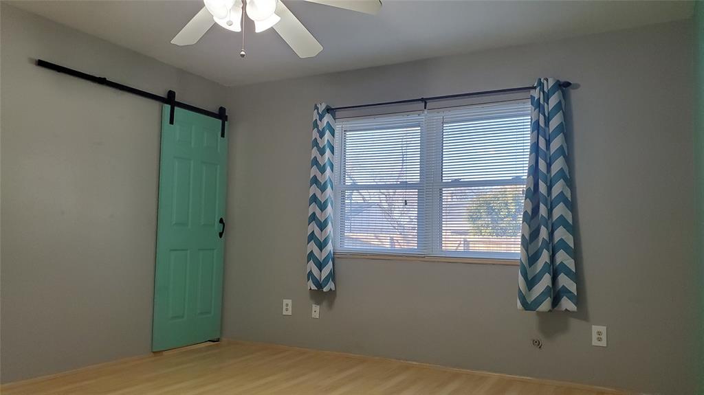 5724 Phelps Street The Colony, TX 75056 - Photo 11 of 11 a view of an empty room with a window