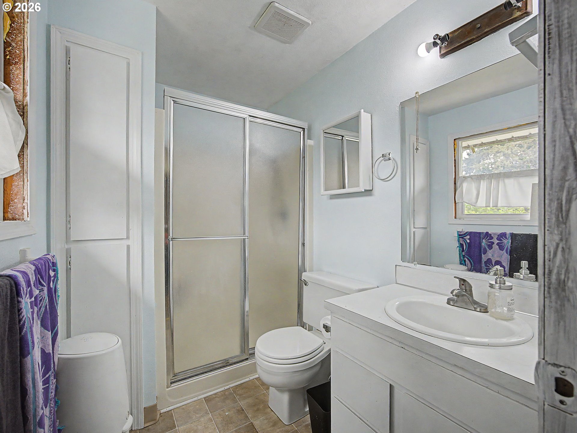 18015 Davis Street Sandy, OR 97055 - Photo 20 of 40 a bathroom with a sink toilet and shower