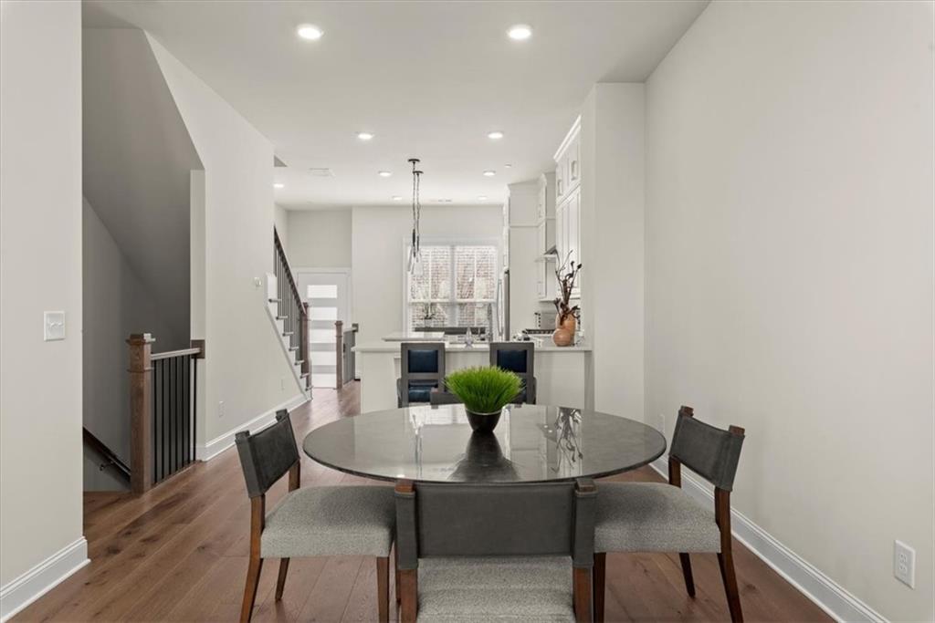 4217 Deming Circle Atlanta, GA 30342 - Photo 2 of 36 a view of a dining room with furniture and wooden floor