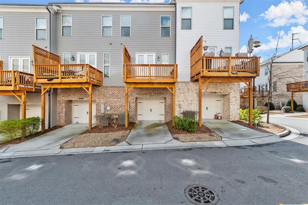 4217 Deming Circle Atlanta, GA 30342 - Photo 29 of 36 a front view of a building with street