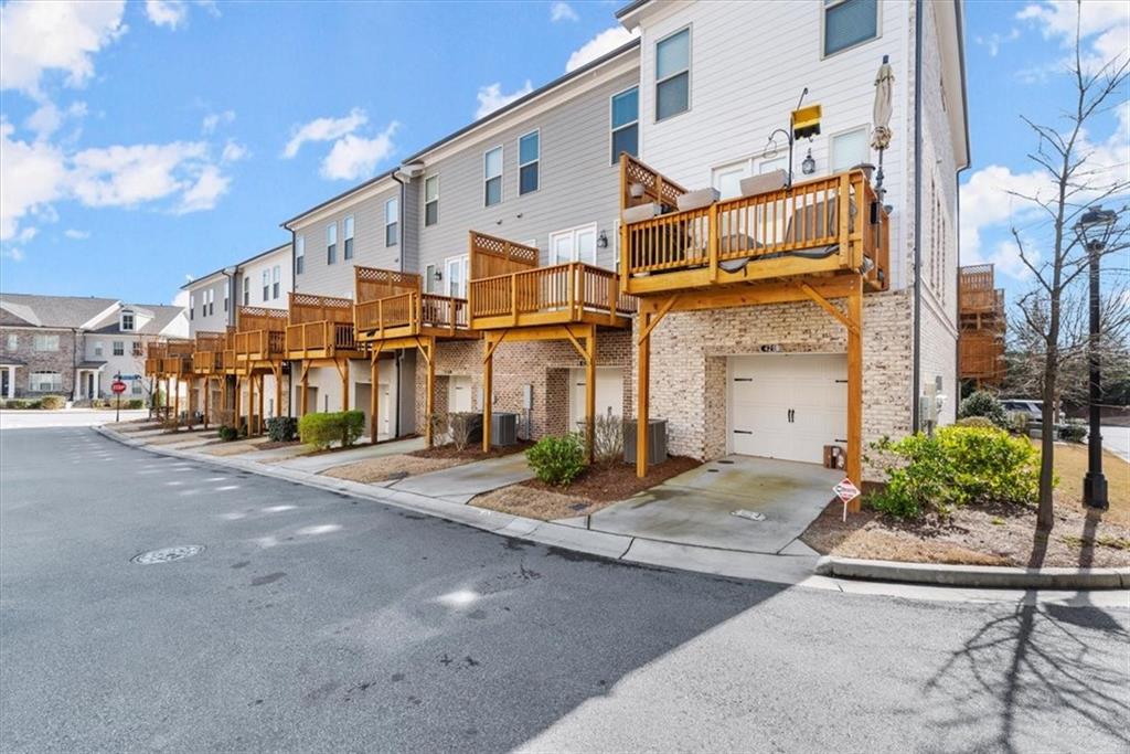 4217 Deming Circle Atlanta, GA 30342 - Photo 33 of 36 a front view of a building with street view