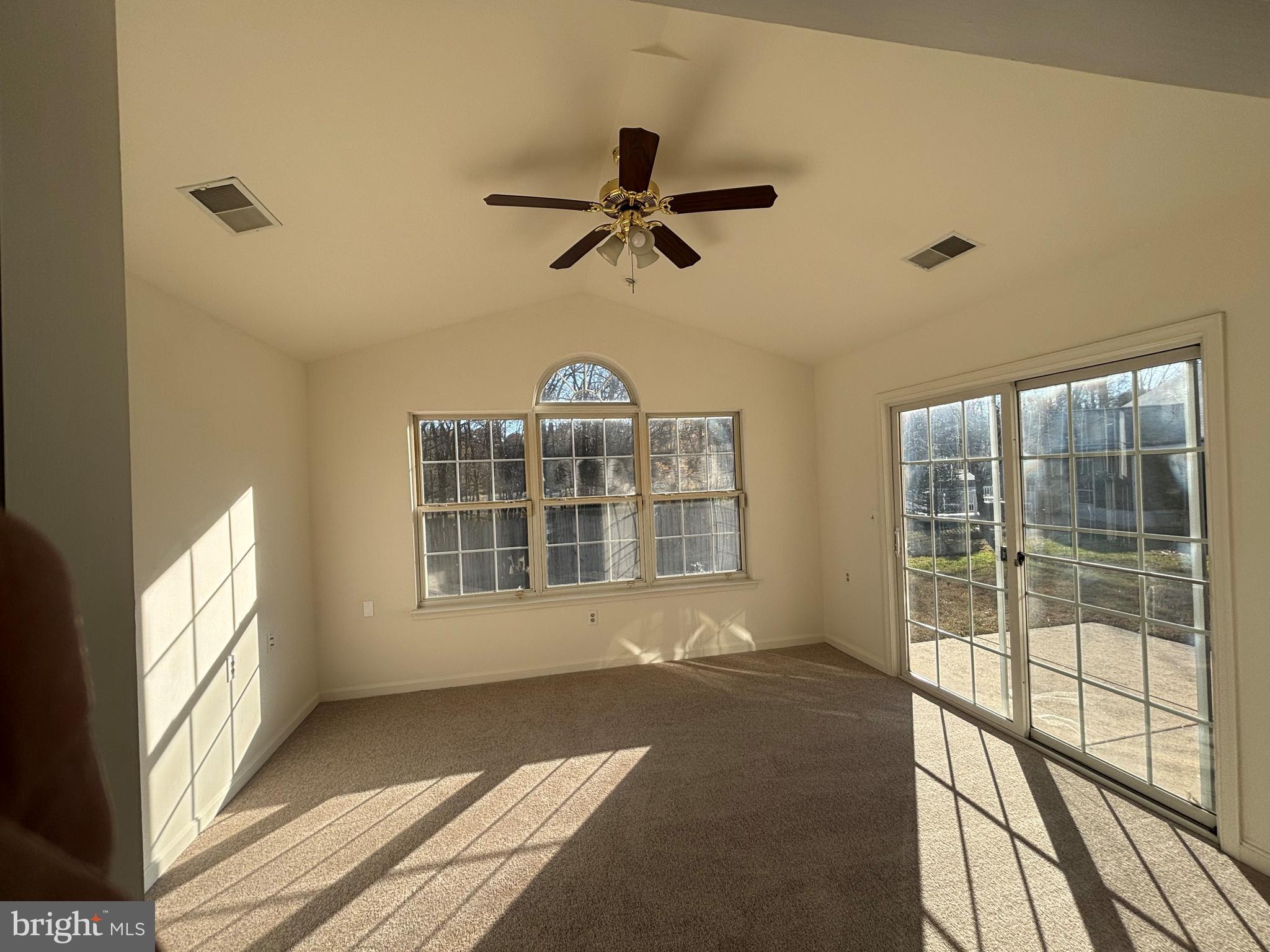 7403 Berryleaf Drive Laurel, MD 20707 - Photo 9 of 17 a view of an empty room with a window
