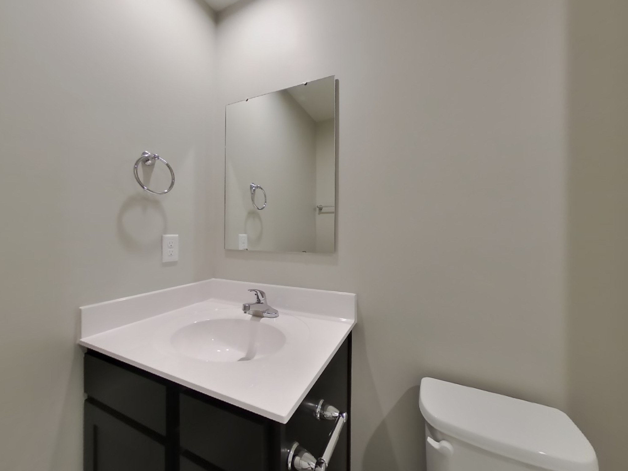 2108 Somersby Trail Spring Hill, TN 37174 - Photo 16 of 18 a bathroom with a toilet sink and mirror