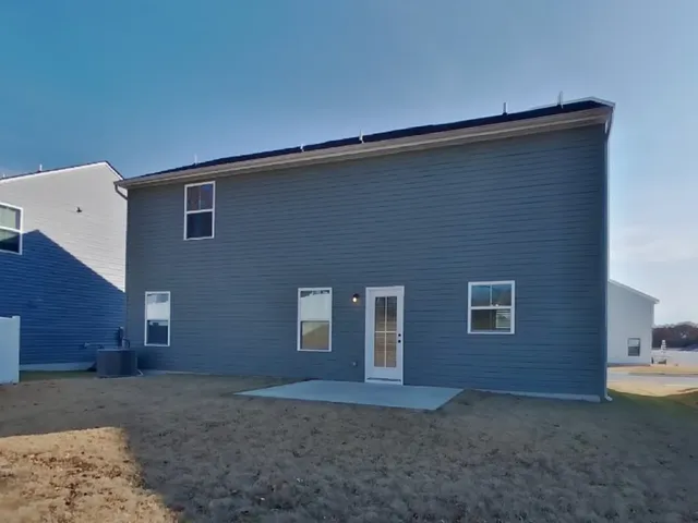 a view of backyard of a house