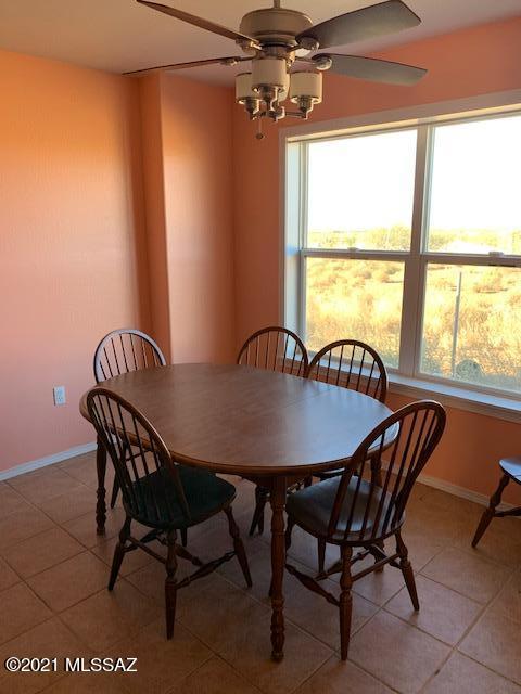 3504 East Howling Wolf Road Willcox, AZ 85643 - Photo 12 of 21 a view of a dining room with furniture window and outside view