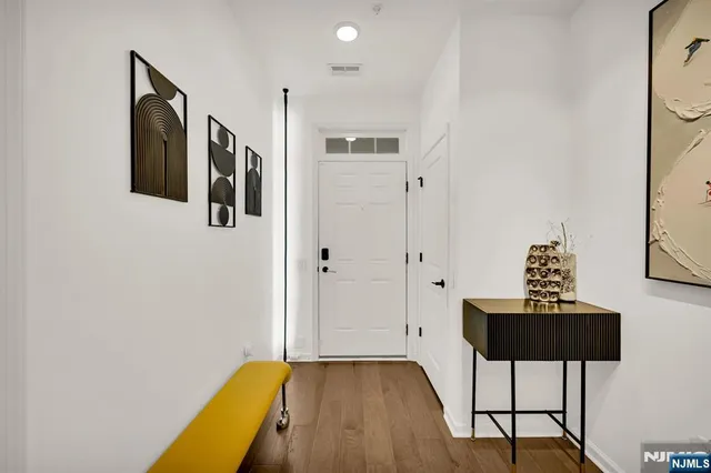 a view of a hallway with workspace