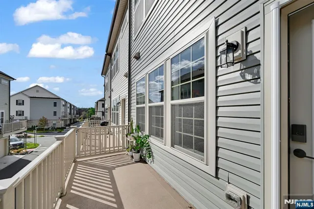 a view of a house with a large window