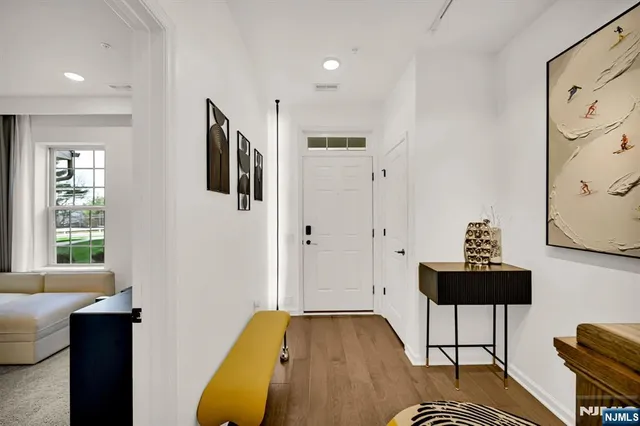 a view of a livingroom with furniture and a couch