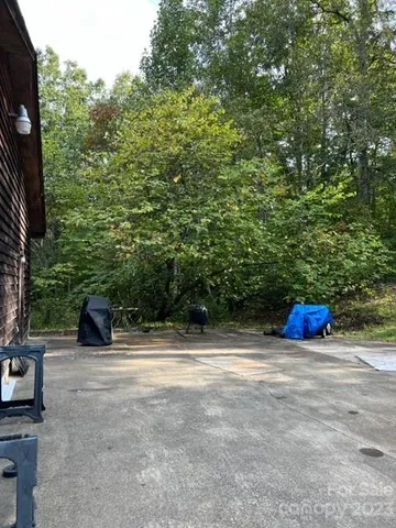 a view of a bench with fire pit