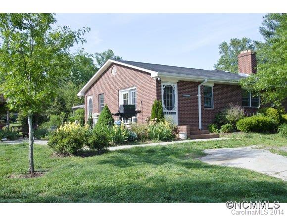 205 Souther Road Fletcher, NC 28732 - Photo 1 of 16 a front view of a house with a yard