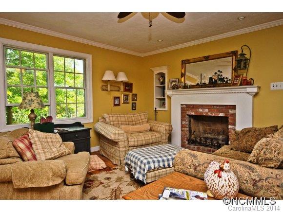 205 Souther Road Fletcher, NC 28732 - Photo 3 of 16 a living room with furniture and a fireplace