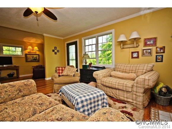 205 Souther Road Fletcher, NC 28732 - Photo 4 of 16 a bedroom with furniture and a large window