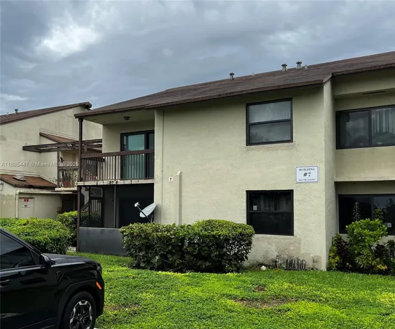 a house view with a garden space