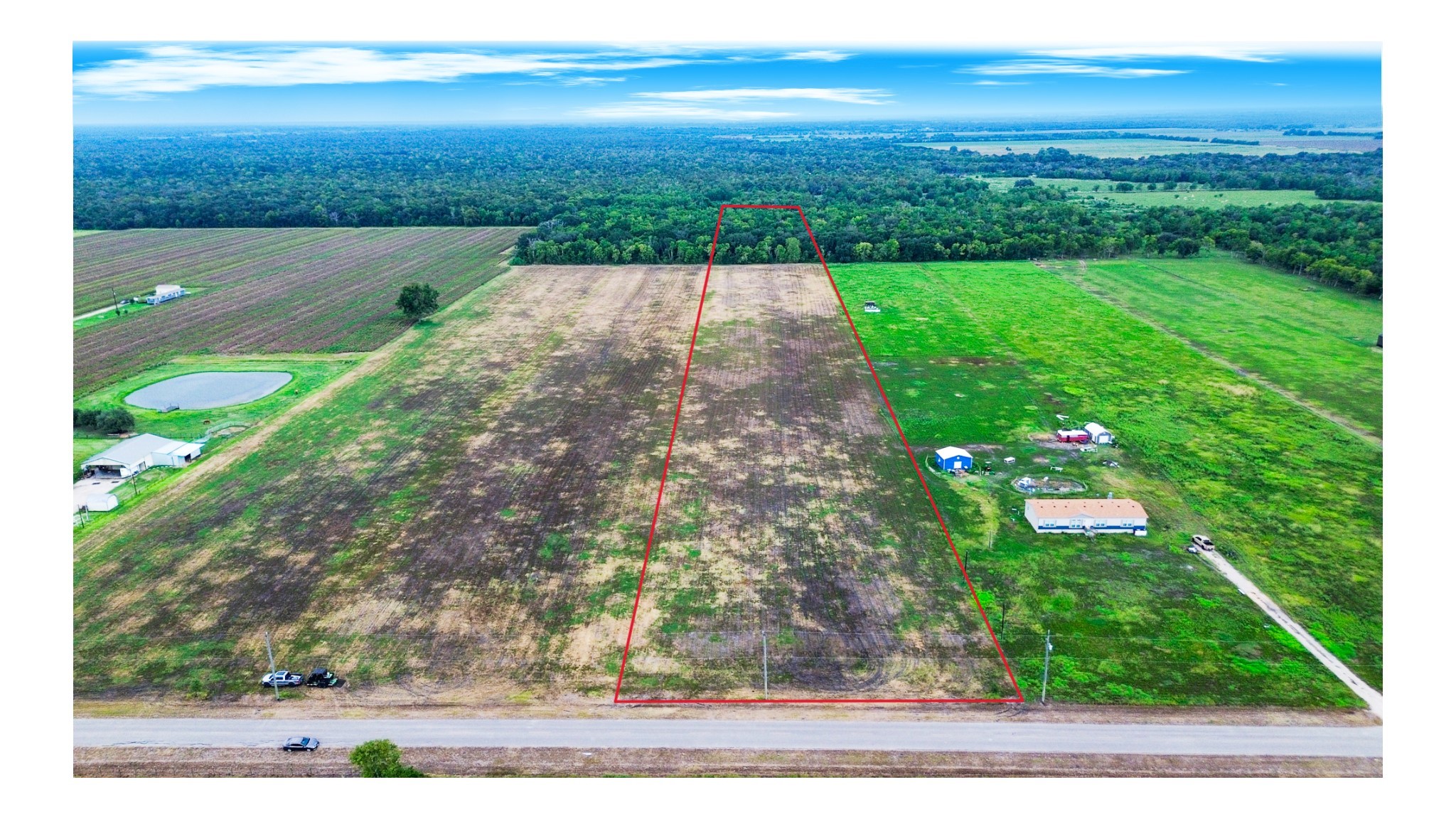 3 Charlie Meyer Road Damon, TX 77430 - Photo 2 of 37 a view of a garden with an outdoor space
