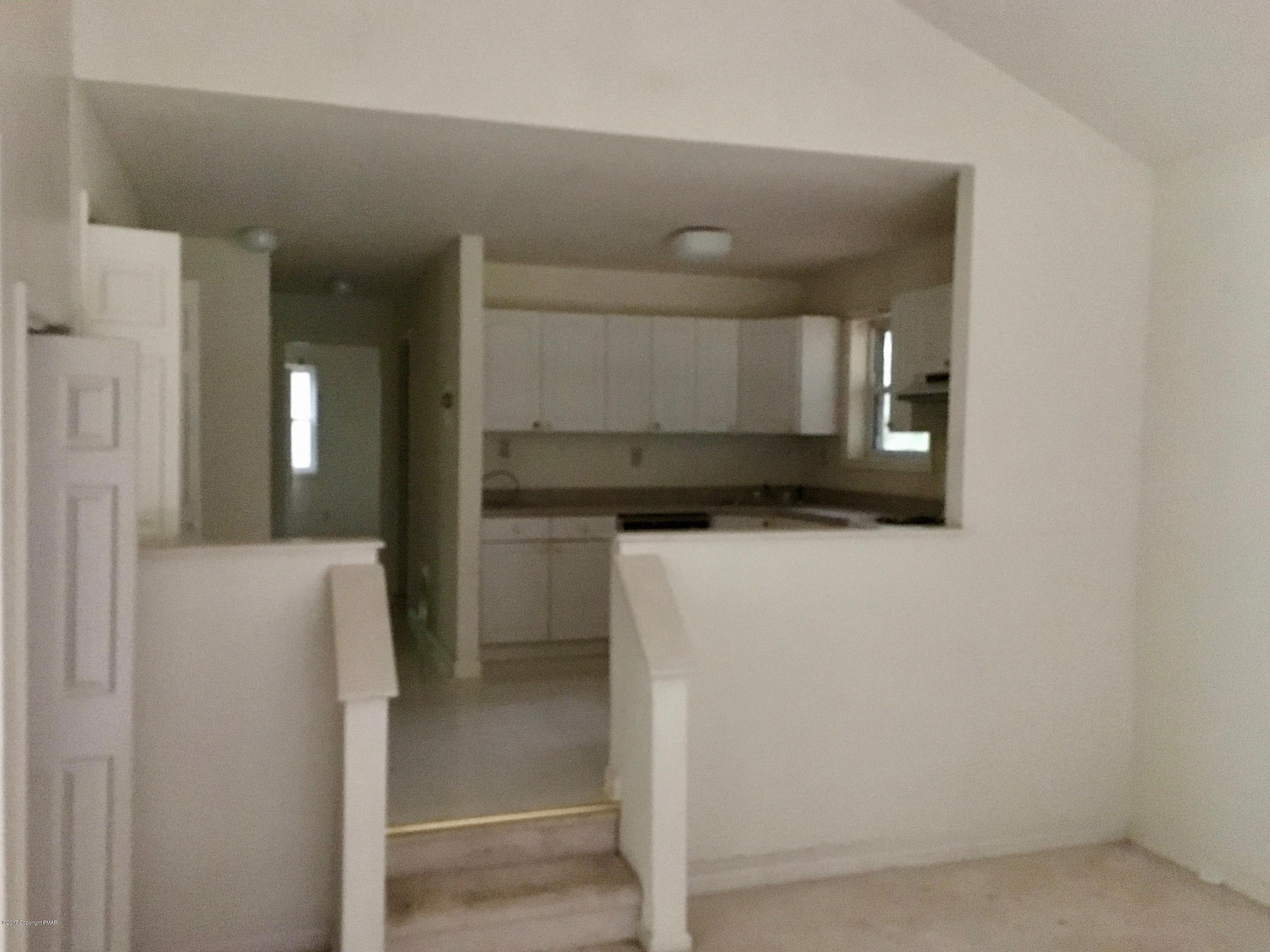 148 Ferncrest Road Blakeslee, PA 18610 - Photo 8 of 26 Dining area into kitchen
