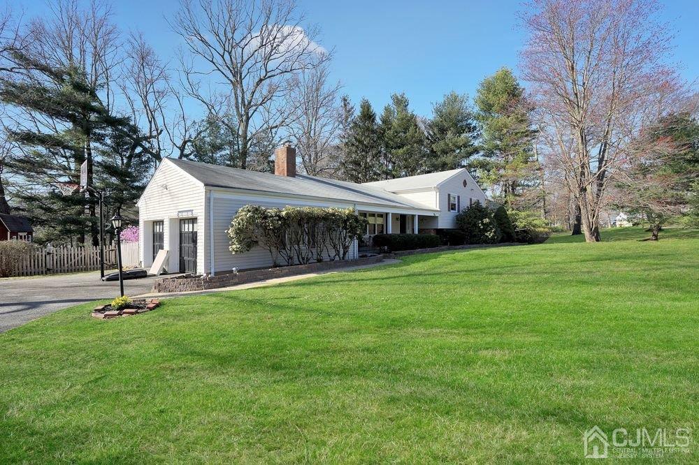 1 Wallace Road Middletown, NJ 07748 - Photo 2 of 28 a view of a house with backyard and a tree