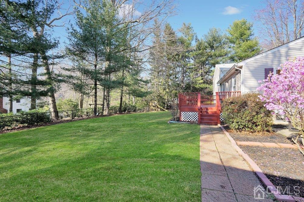 1 Wallace Road Middletown, NJ 07748 - Photo 27 of 28 a pathway of a house with a yard