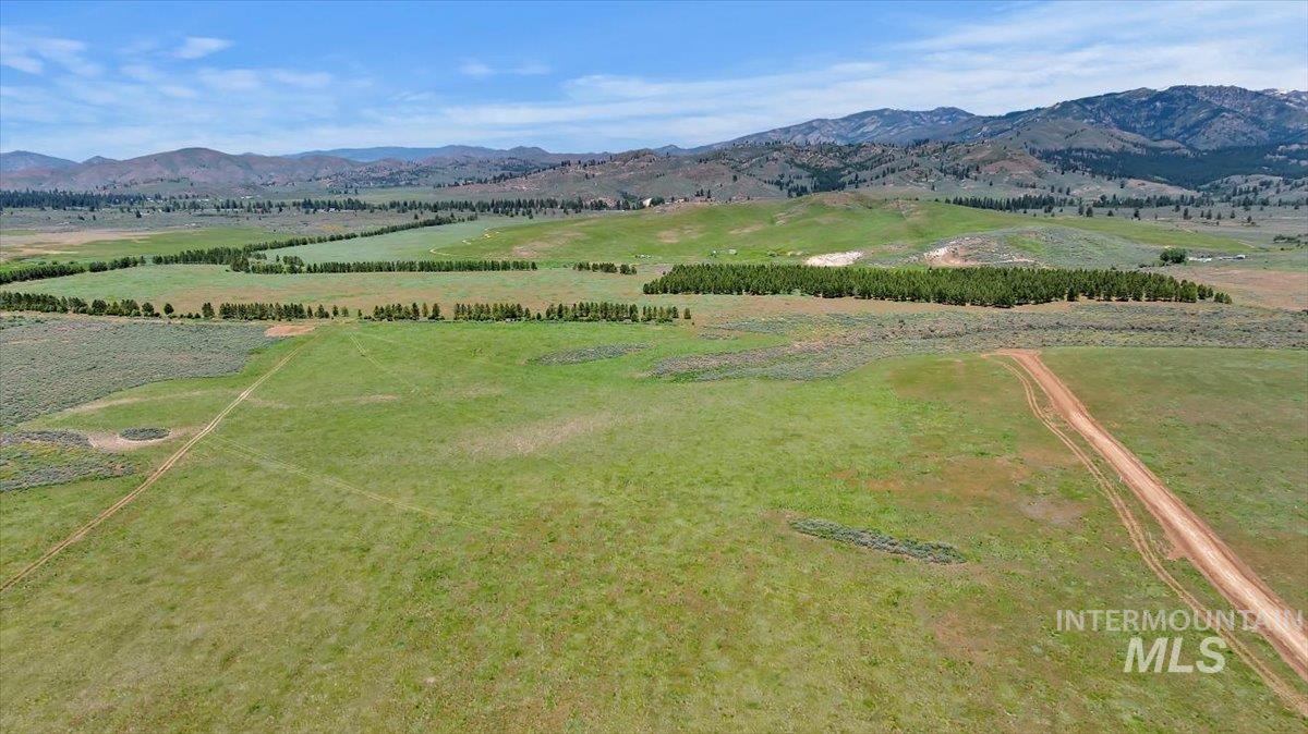 Tbd Tbd Heavenly Ln Prairie Mountain Home, ID 83647 - Photo 2 of 16 Aerial view of sparsely populated area with mountains