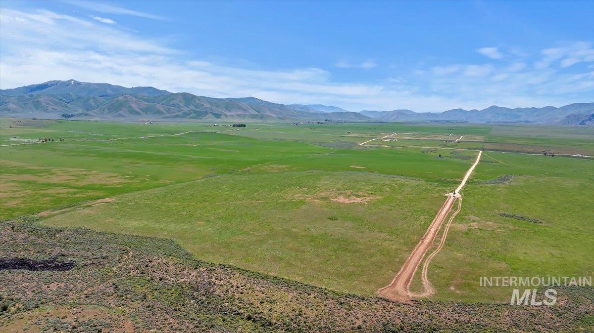 Tbd Tbd Heavenly Ln Prairie Mountain Home, ID 83647 - Photo 9 of 16 Aerial view of sparsely populated area featuring mountains