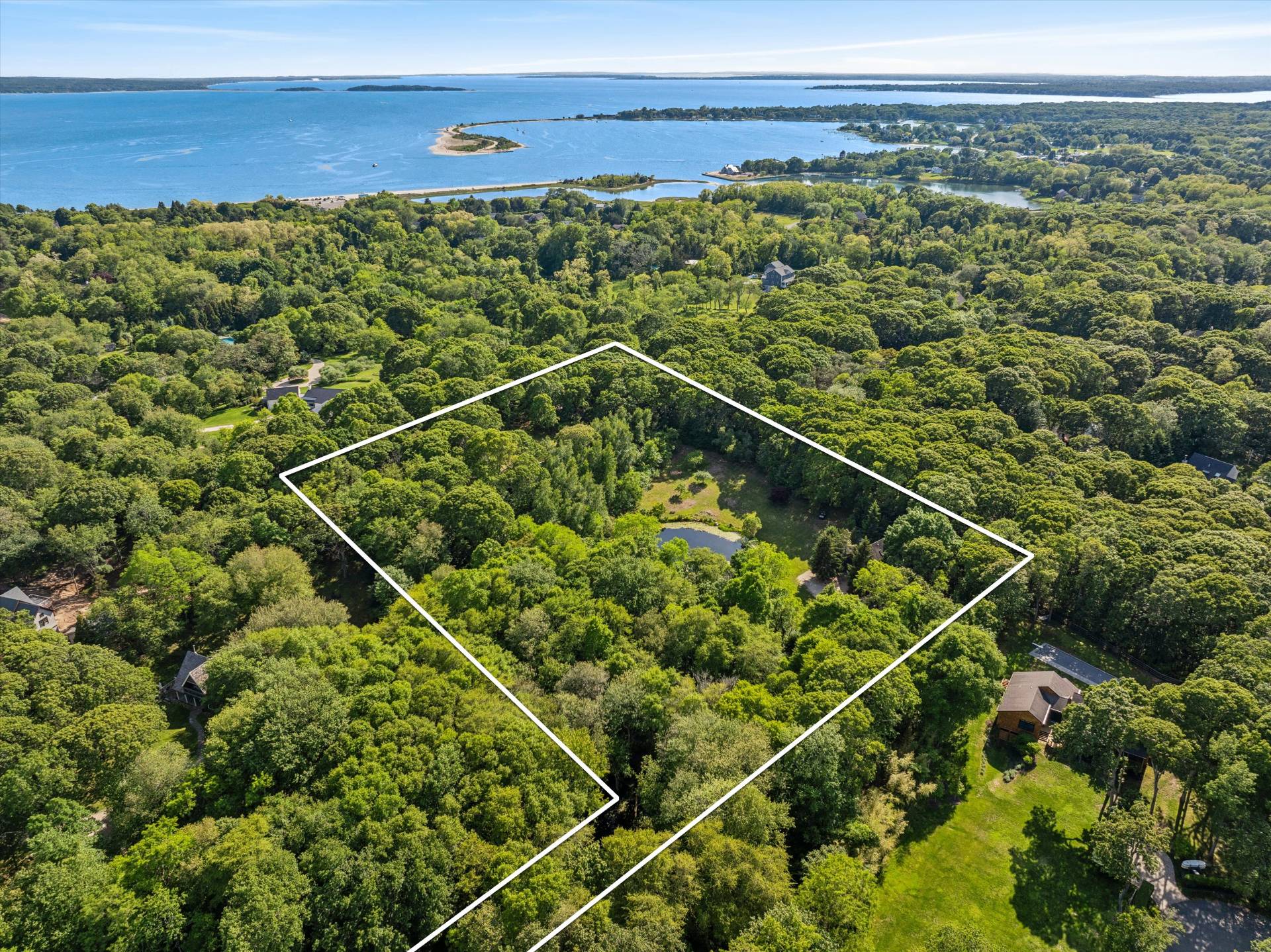 72 South Ferry Road Shelter Island, NY 11964 - Photo 2 of 26 a view of a yard