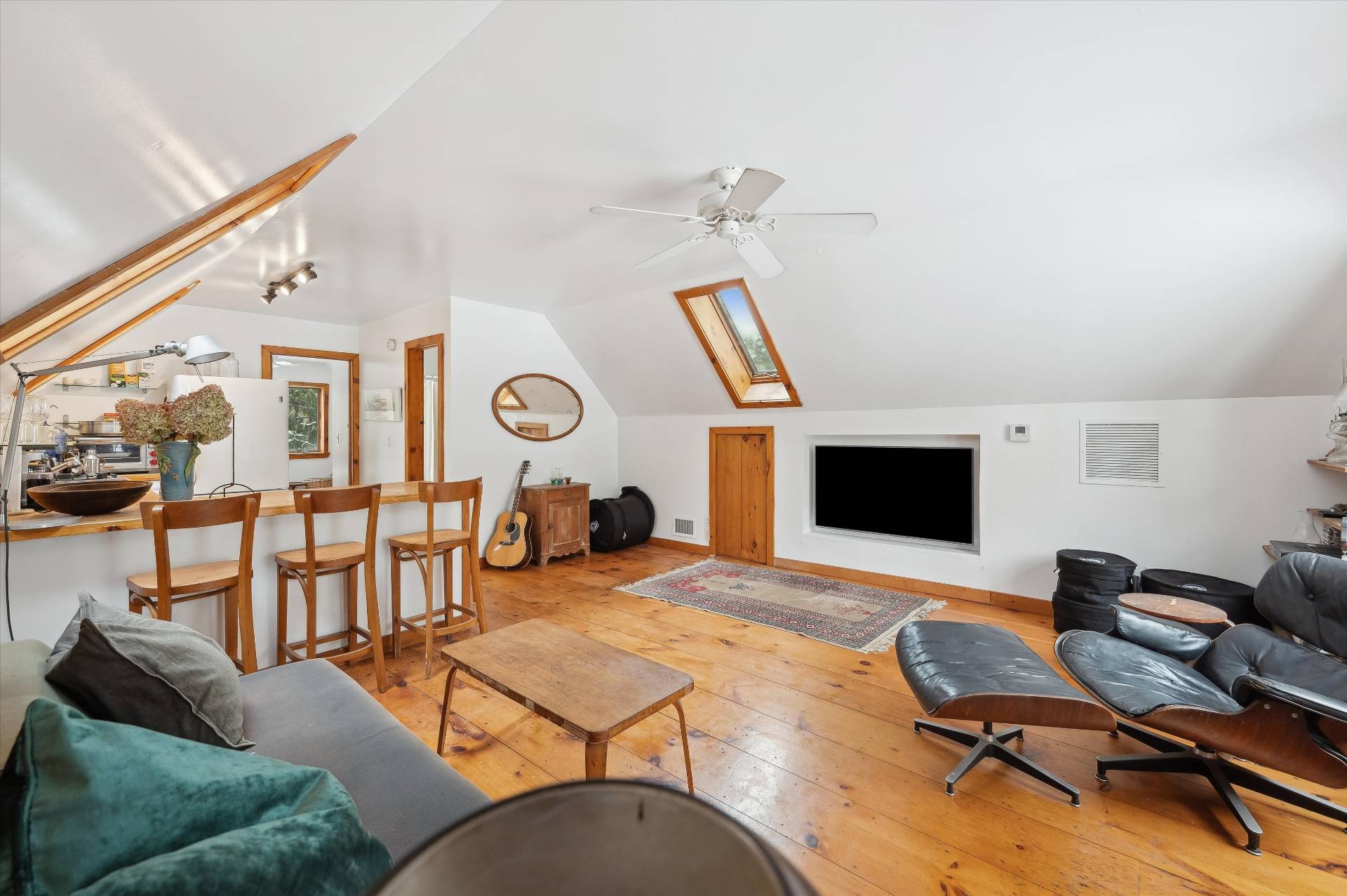 72 South Ferry Road Shelter Island, NY 11964 - Photo 21 of 26 a living room with furniture and a flat screen tv