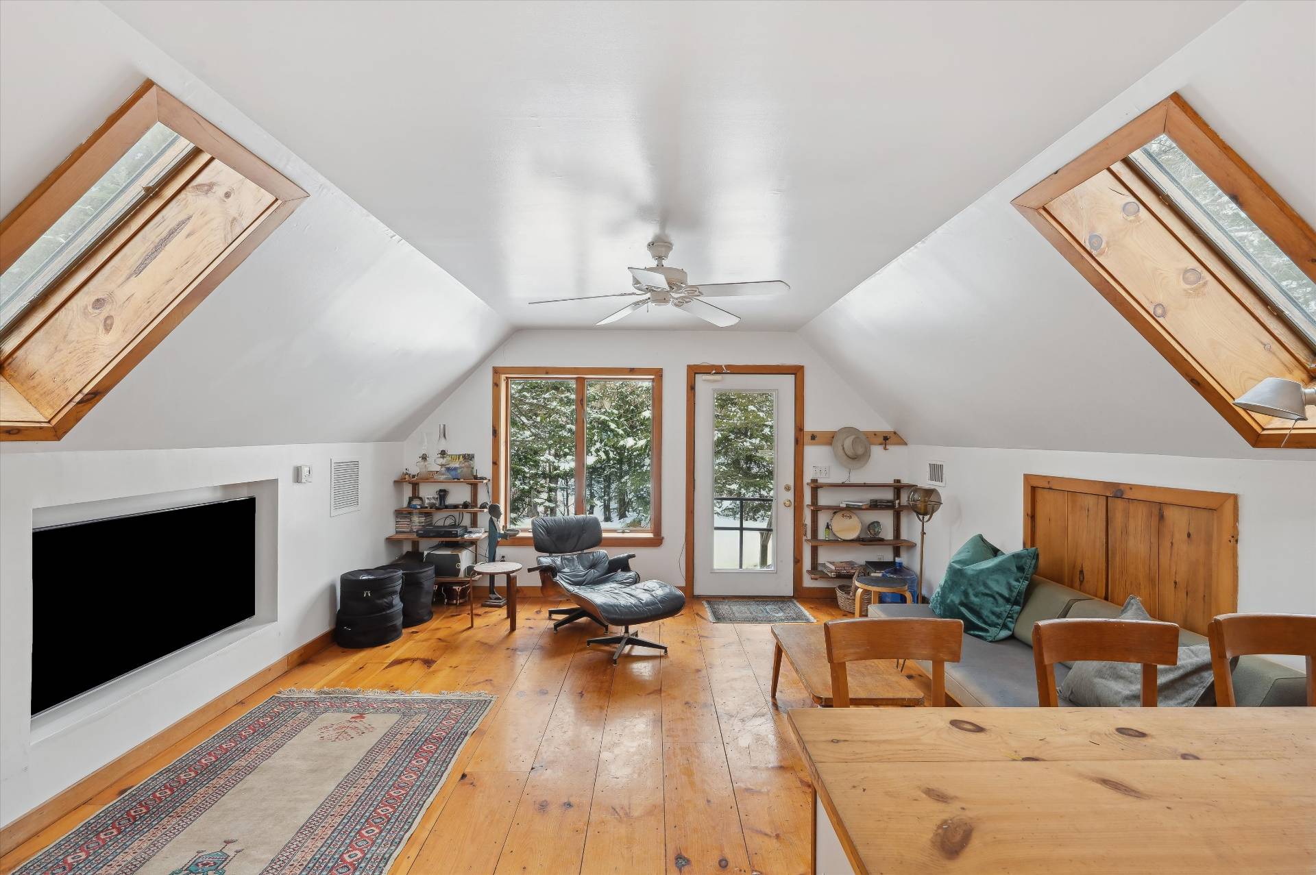 72 South Ferry Road Shelter Island, NY 11964 - Photo 23 of 26 a living room with furniture and a flat screen tv