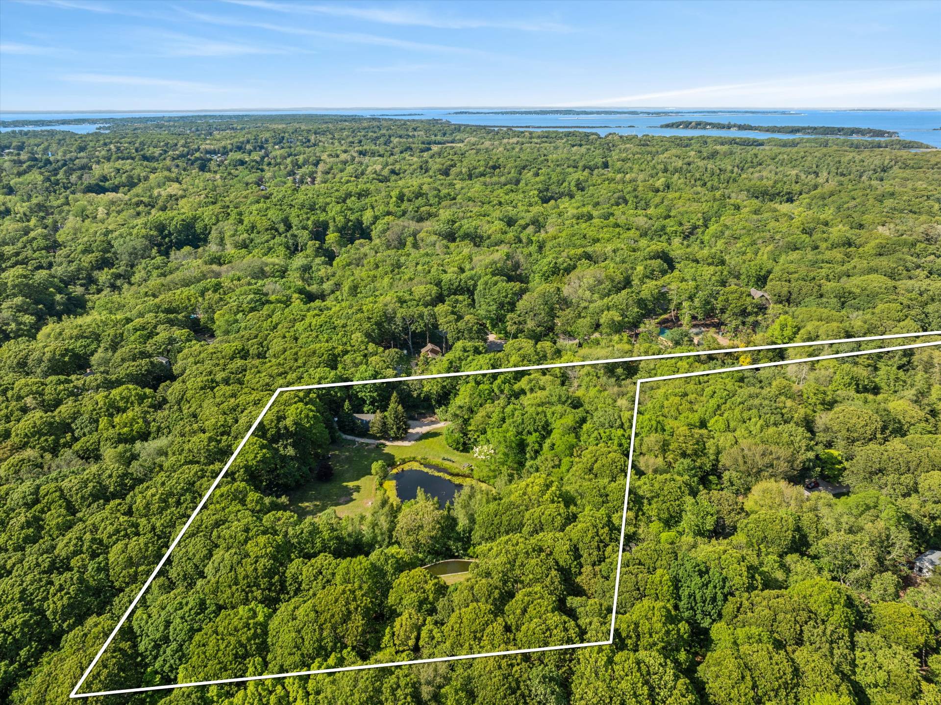 72 South Ferry Road Shelter Island, NY 11964 - Photo 5 of 26 a view of a yard