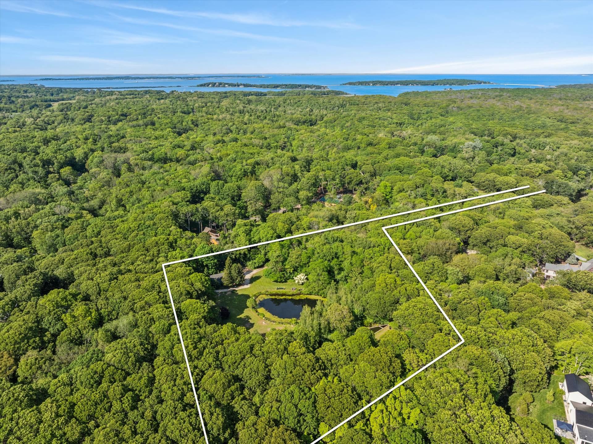 72 South Ferry Road Shelter Island, NY 11964 - Photo 6 of 26 a view of a field with an outdoor space