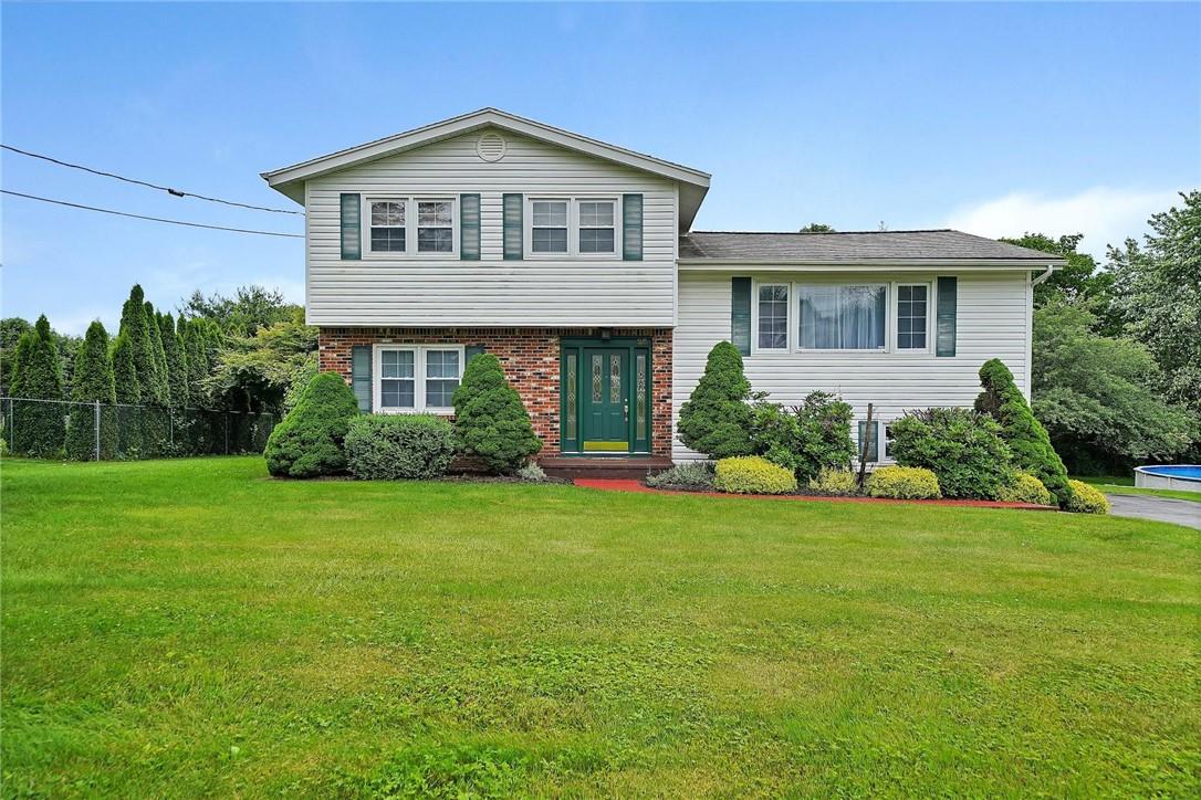 a front of a house with a garden