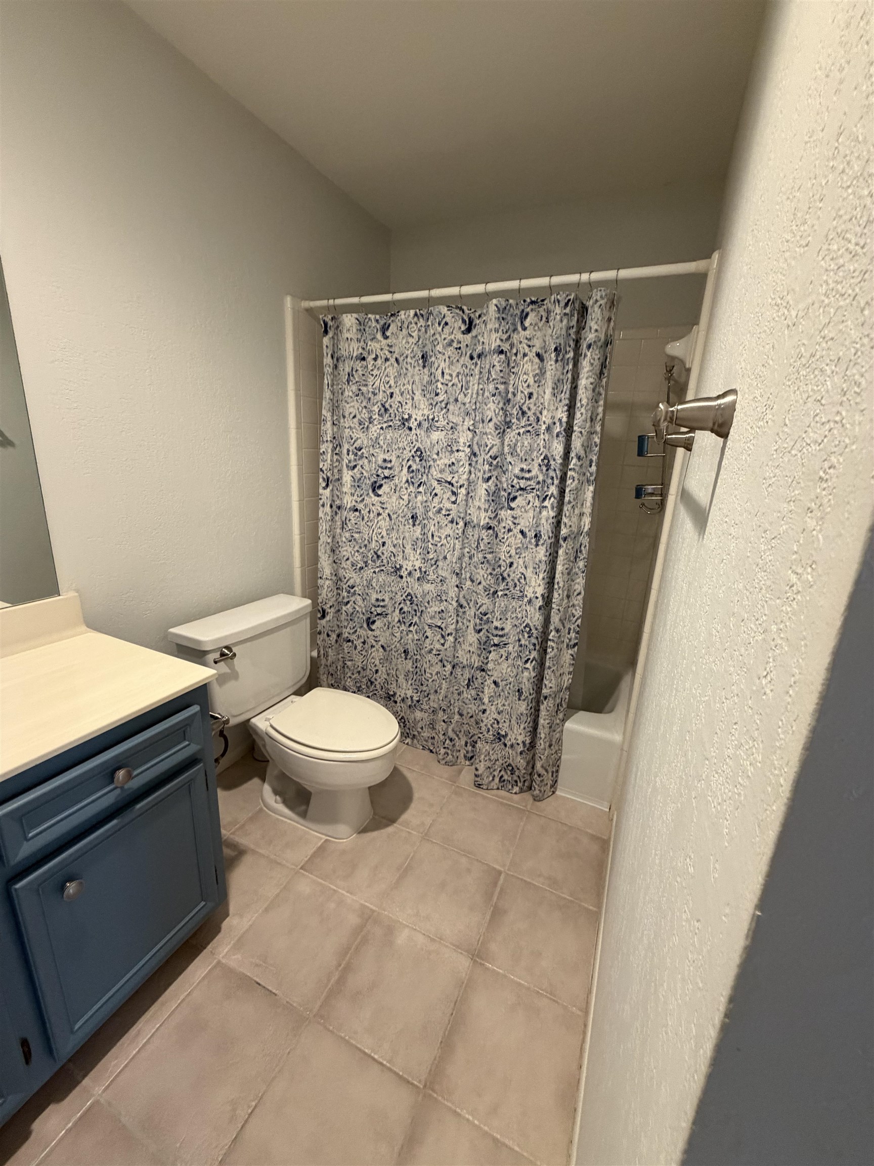 307 Crestview Horseshoe Bay, TX 78657 - Photo 15 of 24 a bathroom with a toilet and a shower