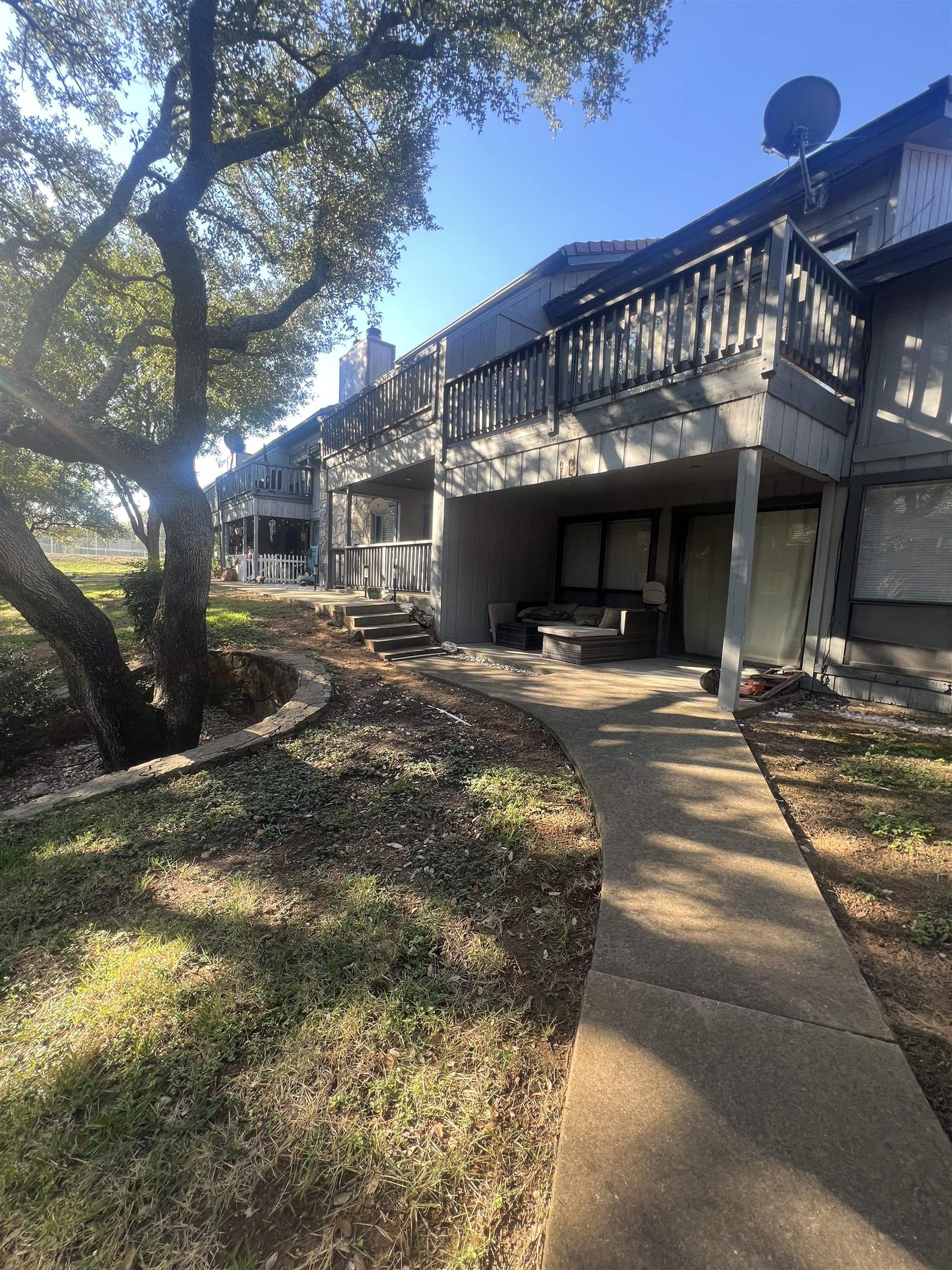 307 Crestview Horseshoe Bay, TX 78657 - Photo 23 of 24 a view of a house with a patio
