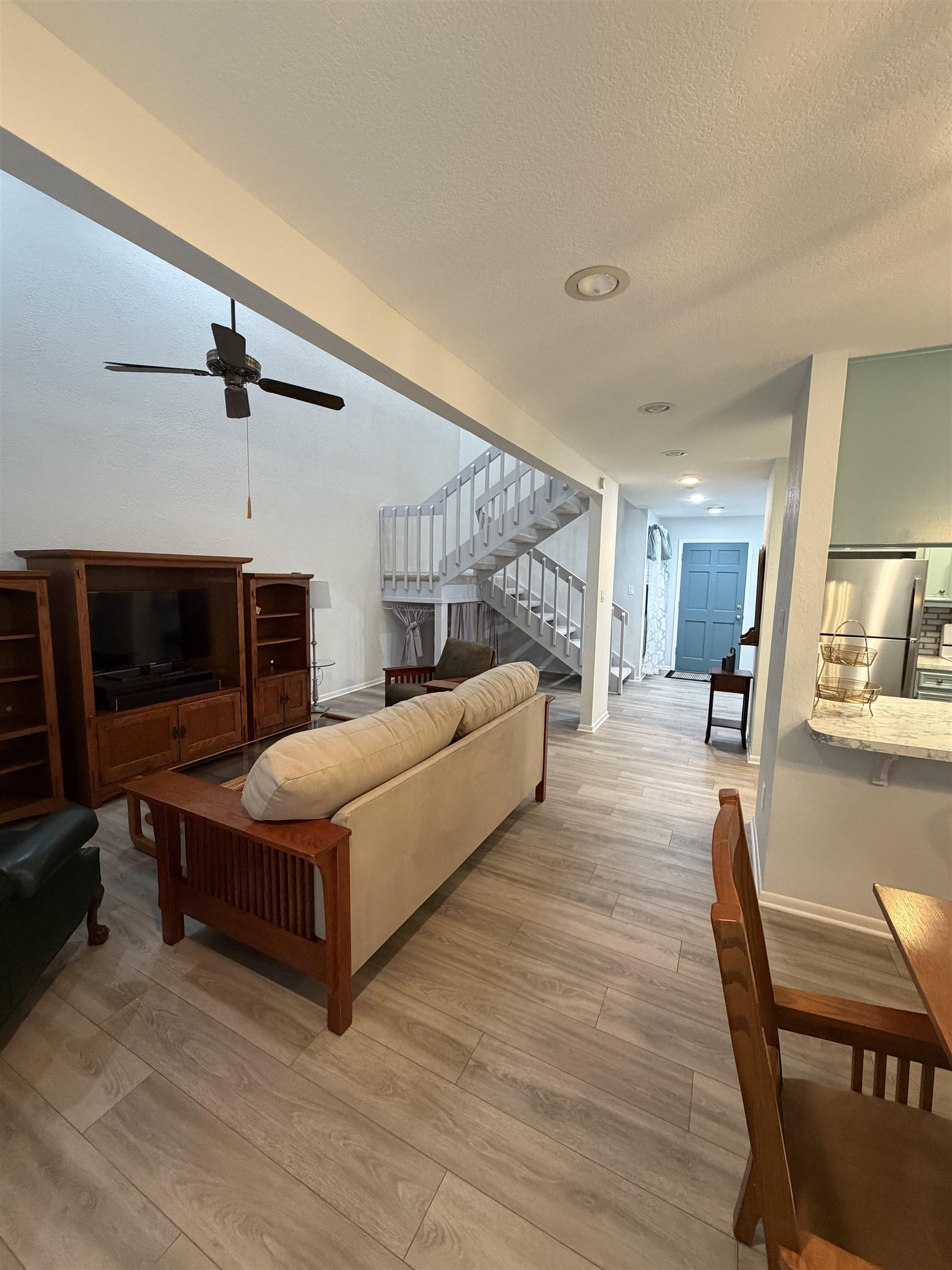 307 Crestview Horseshoe Bay, TX 78657 - Photo 6 of 24 a living room with furniture and a flat screen tv
