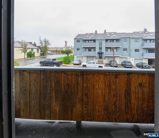 a view of balcony with furniture