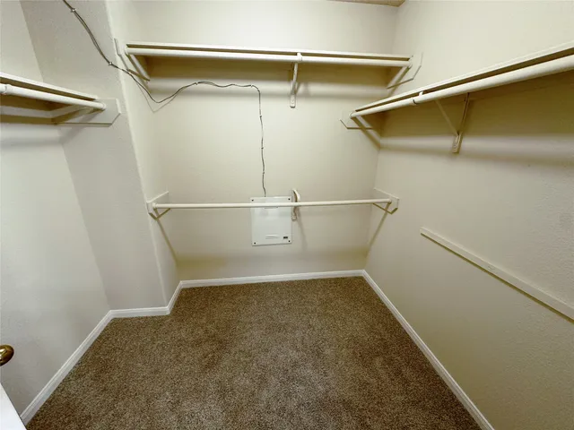a view of a room with racks on the wall