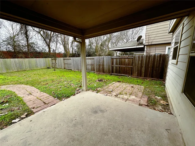 a view of backyard with green space