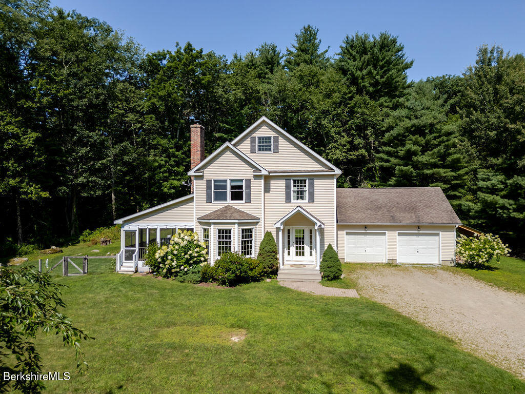 483 Home Road Sheffield, MA 01230 - Photo 1 of 38 a front view of a house with a yard