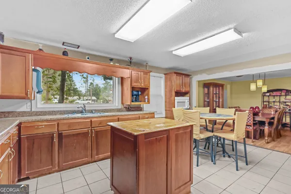 a kitchen with a sink and counter