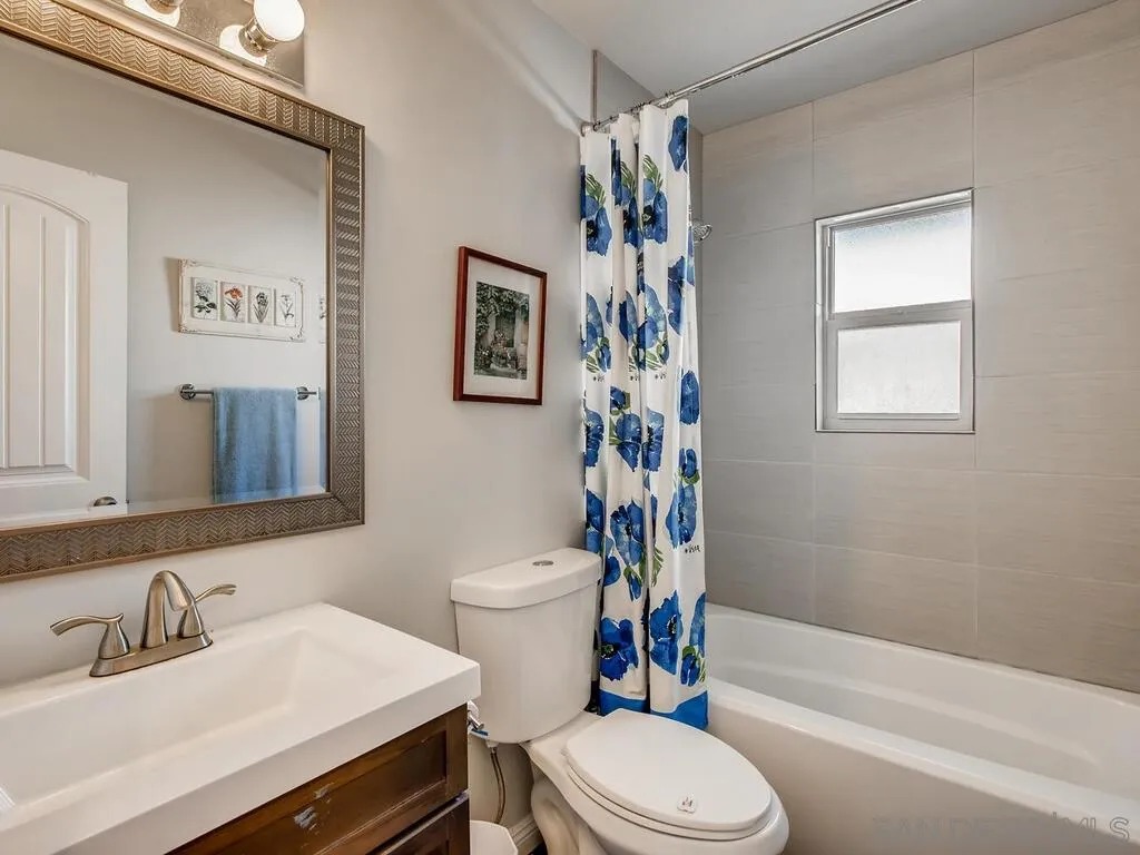 9559 Tuthill Way Santee, CA 92071 - Photo 11 of 27 a bathroom with a sink toilet and shower