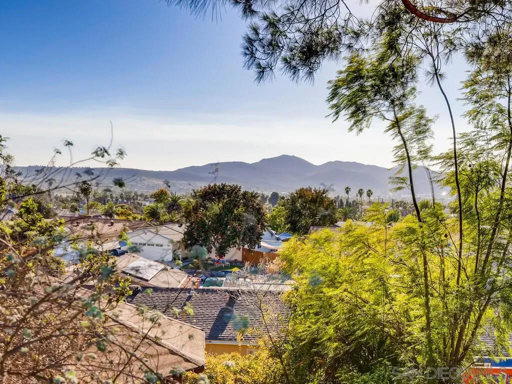 9559 Tuthill Way Santee, CA 92071 - Photo 2 of 27 a view of a bunch of trees and bushes