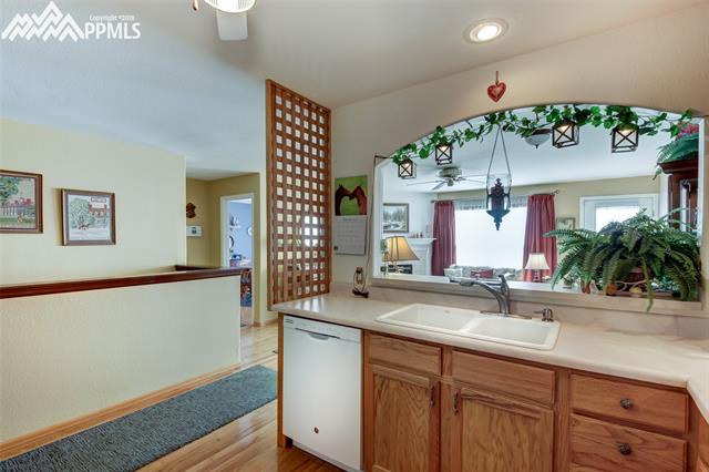 3639 Indigo Ridge Point Colorado Springs, CO 80910 - Photo 7 of 17 Kitchen pass through
