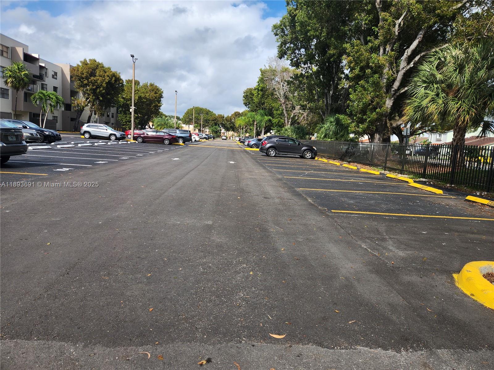 8000 Southwest 149th Avenue, Unit A107 Miami, FL 33193 - Photo 14 of 15 a view of a street