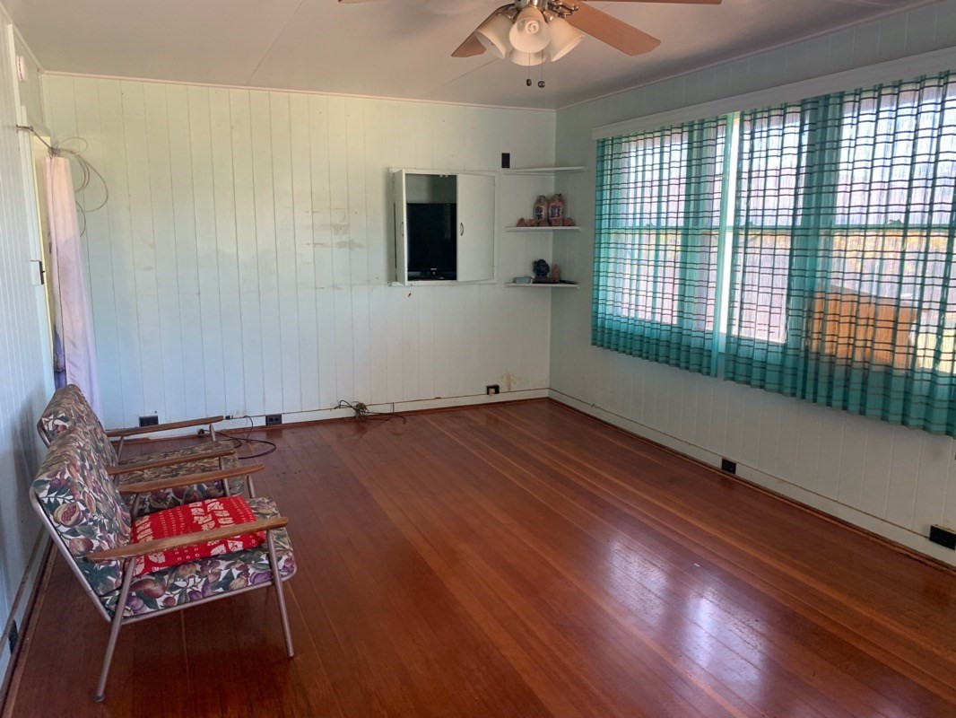 7975 Ulili Road Kekaha, HI 96752 - Photo 6 of 12 a living room with furniture and a flat screen tv