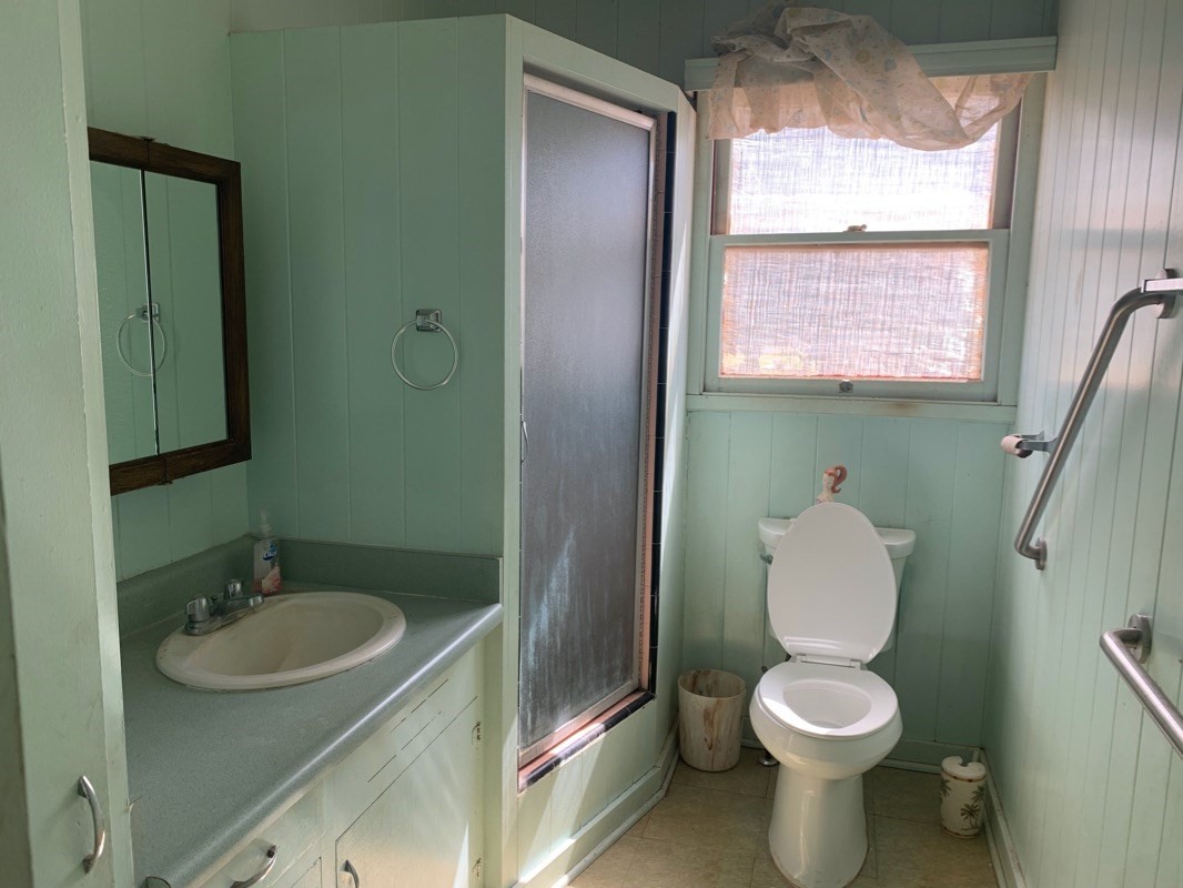7975 Ulili Road Kekaha, HI 96752 - Photo 9 of 12 a bathroom with a sink toilet and shower