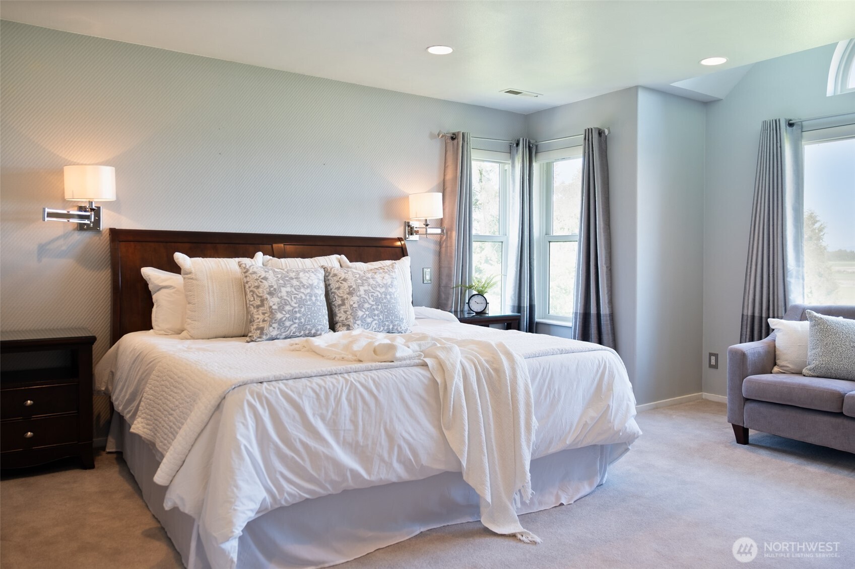 746 Van Dyk Road Lynden, WA 98264 - Photo 17 of 40 a bedroom with a bed and a couch