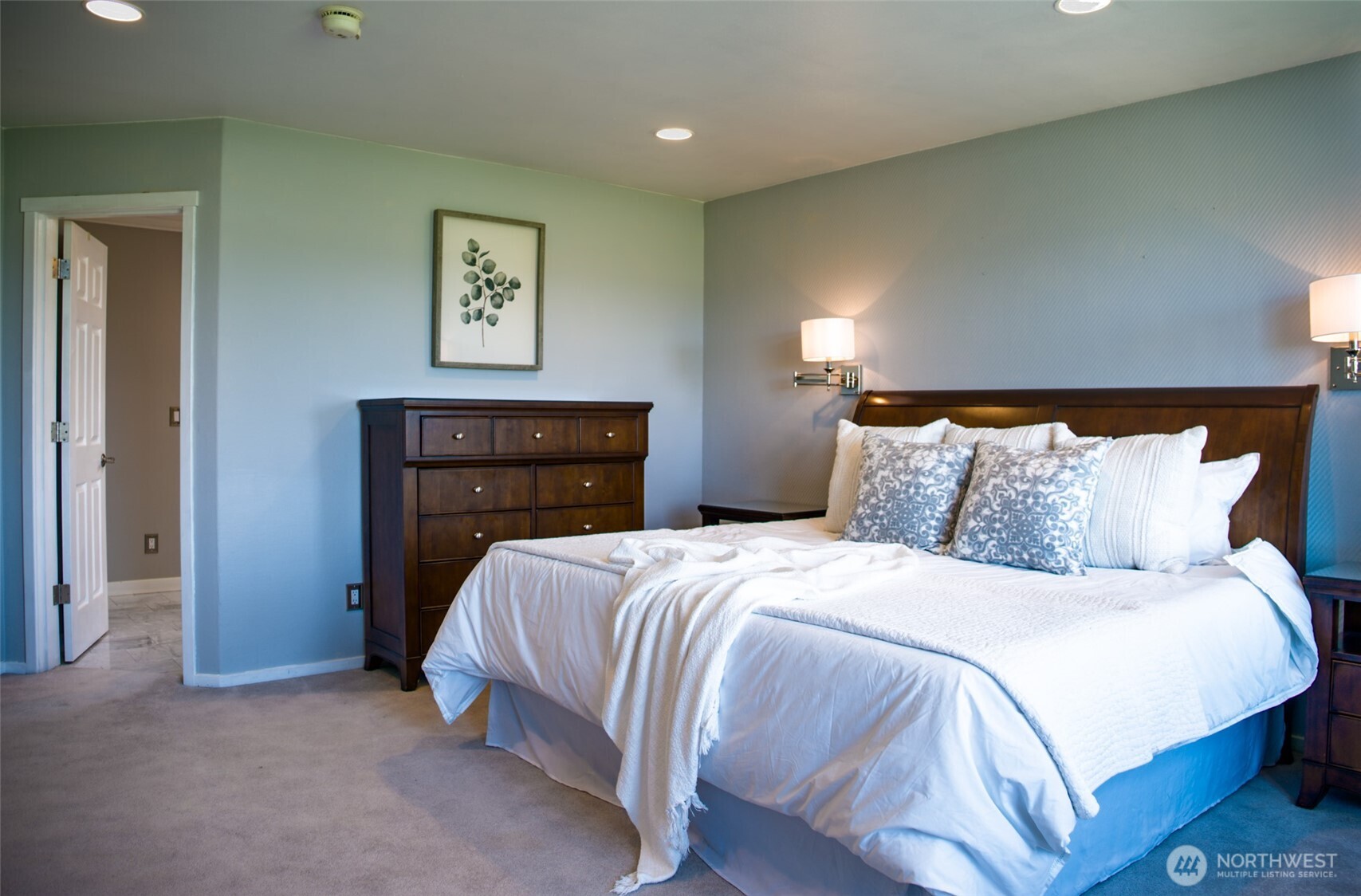 746 Van Dyk Road Lynden, WA 98264 - Photo 18 of 40 a bedroom with a bed and a lamp