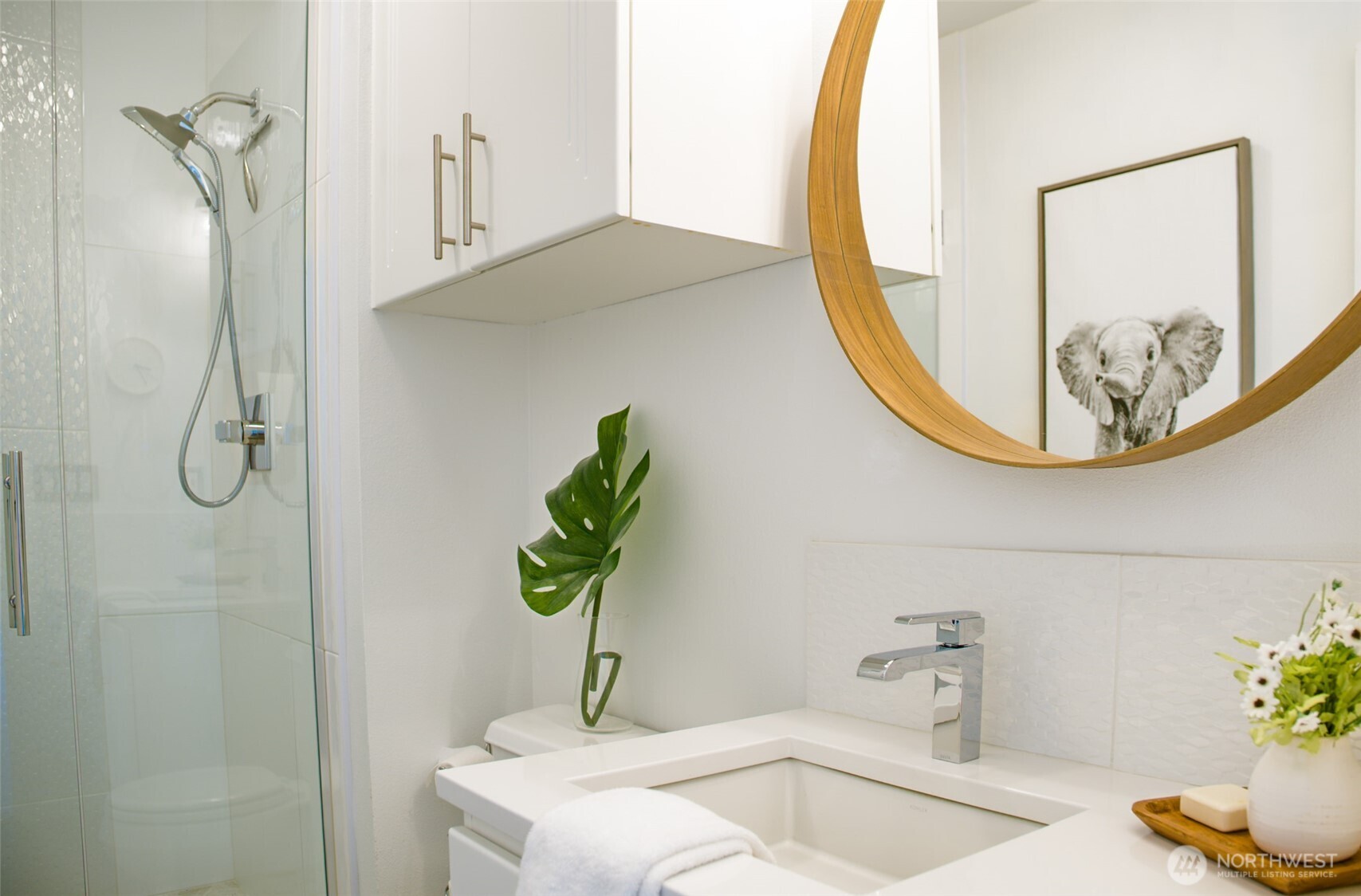 746 Van Dyk Road Lynden, WA 98264 - Photo 25 of 40 a bathroom with a sink a mirror and a shower